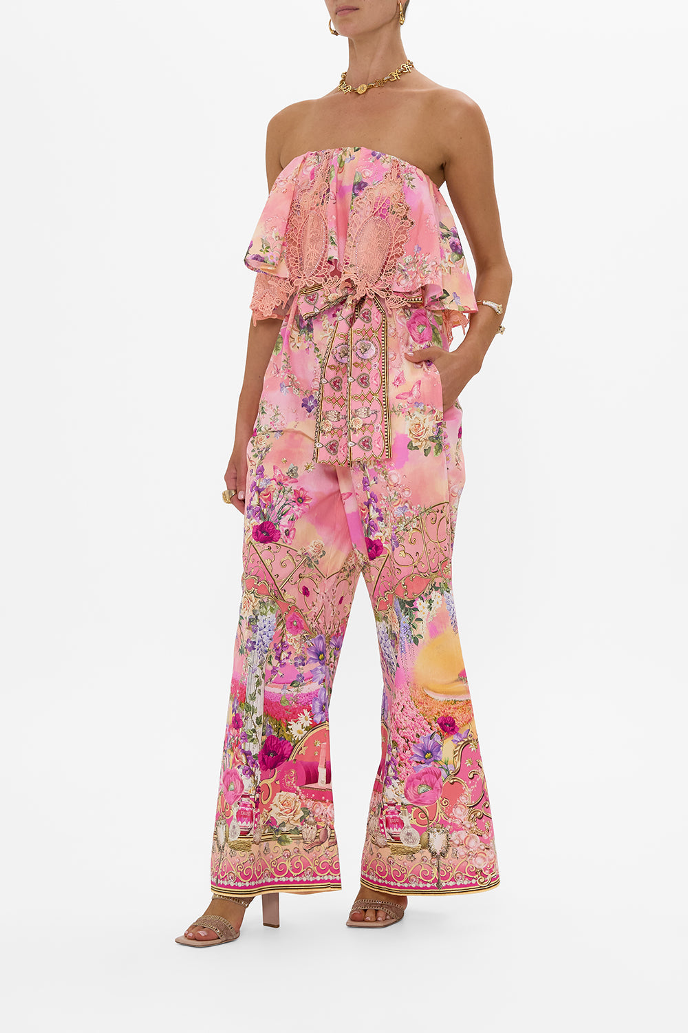 The CAMILLA STRAPLESS JUMPSUIT WITH FRILL TOTALLY OZMOPOLITAN in our  print.