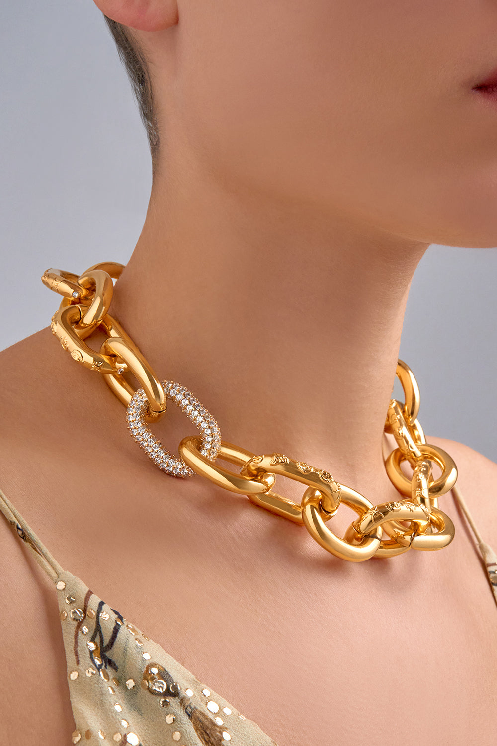CAMILLA Gold Necklace in Cosmic Cartouche Print. 