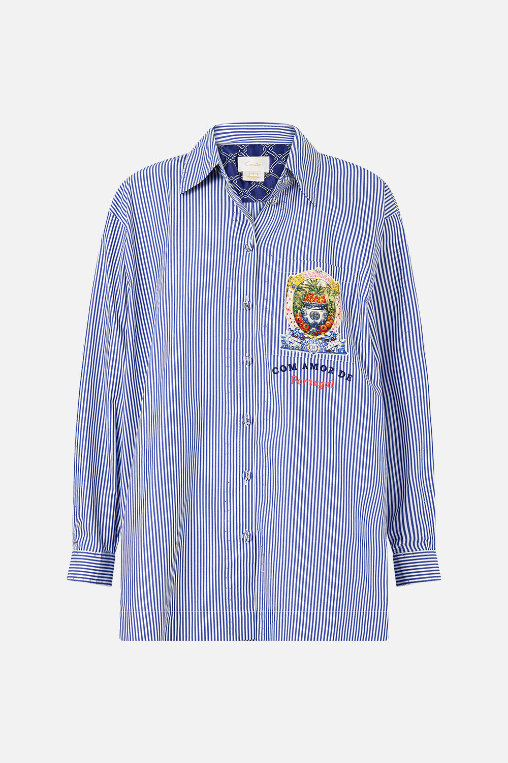 The CAMILLA STEPPED HEM SHIRT SONG OF SAINT ANTHONY in our  print.