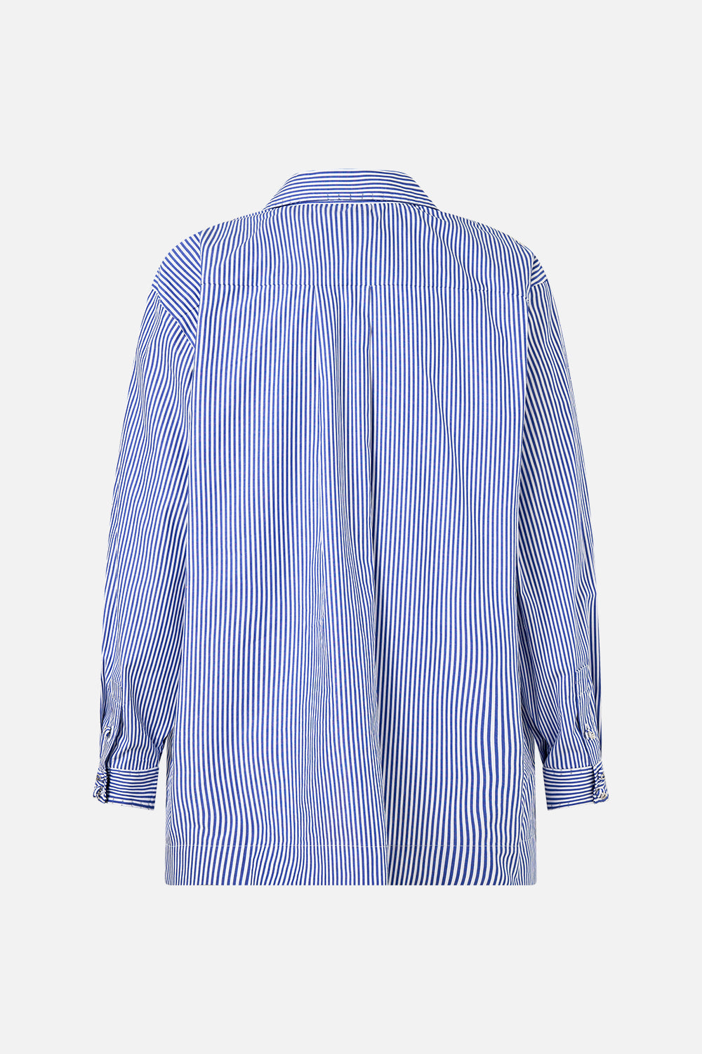 The CAMILLA STEPPED HEM SHIRT SONG OF SAINT ANTHONY in our  print.