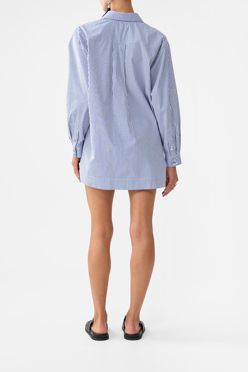 The CAMILLA STEPPED HEM SHIRT SONG OF SAINT ANTHONY in our  print.