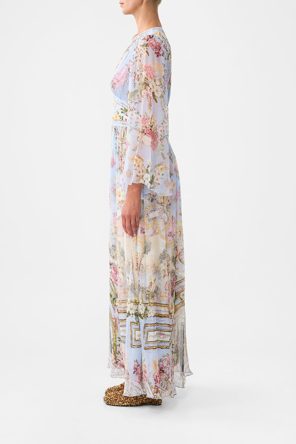 The CAMILLA FLARED SLEEVE DRESS TILED IN TIME in our  print.