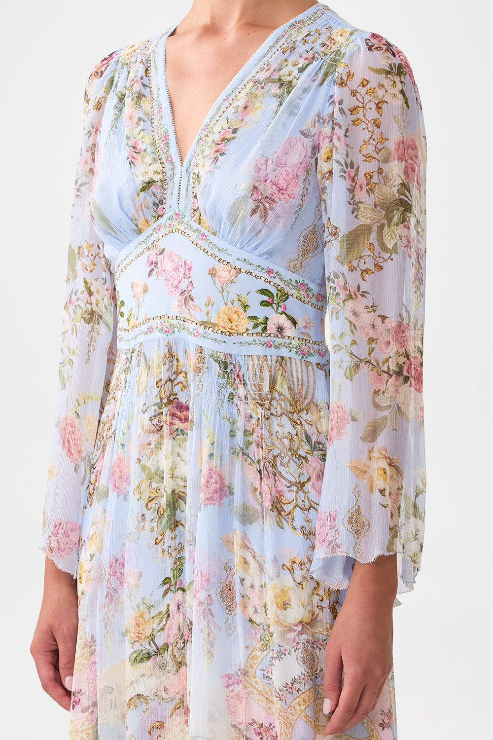 The CAMILLA FLARED SLEEVE DRESS TILED IN TIME in our  print.