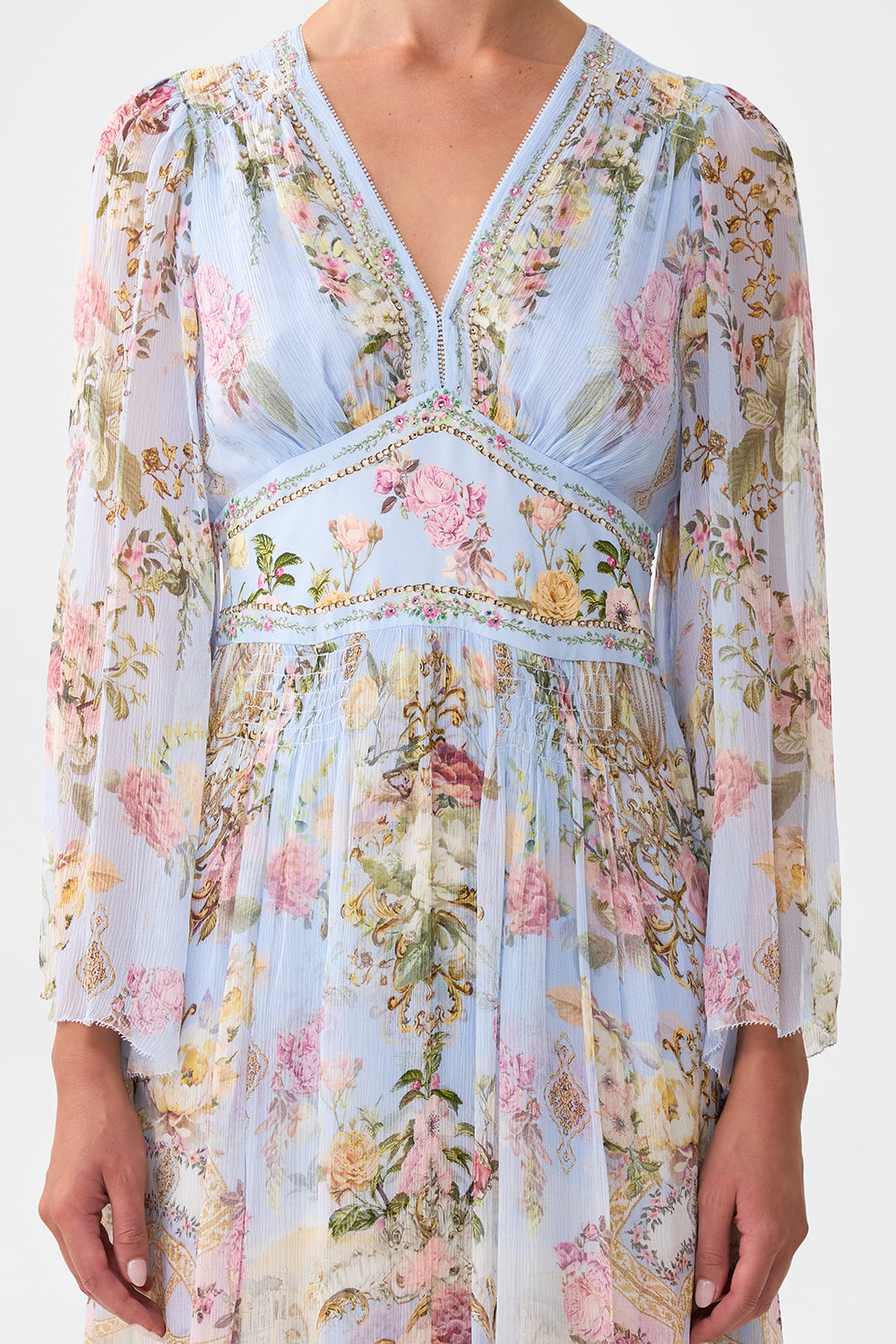 The CAMILLA FLARED SLEEVE DRESS TILED IN TIME in our  print.