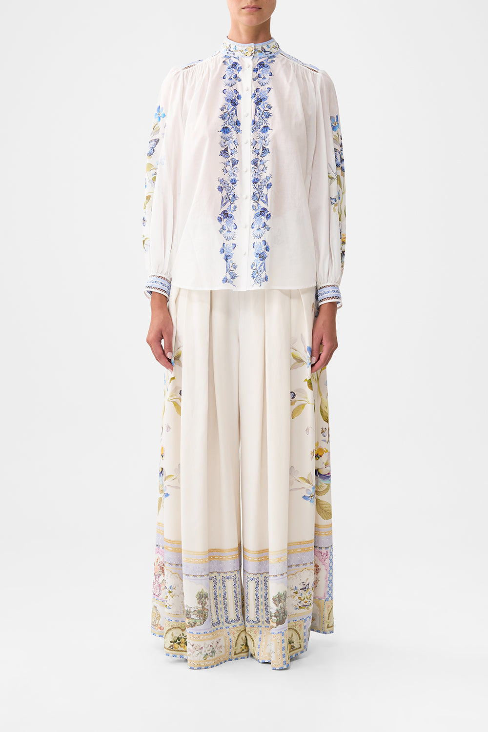 The CAMILLA HIGH NECK BUTTON THROUGH BLOUSE BOTANICAL BALLADS in our BOTANICAL BALLADS print.