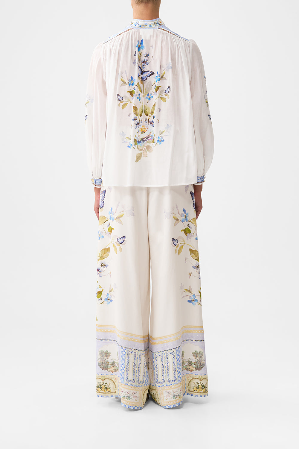 The CAMILLA HIGH NECK BUTTON THROUGH BLOUSE BOTANICAL BALLADS in our  print.