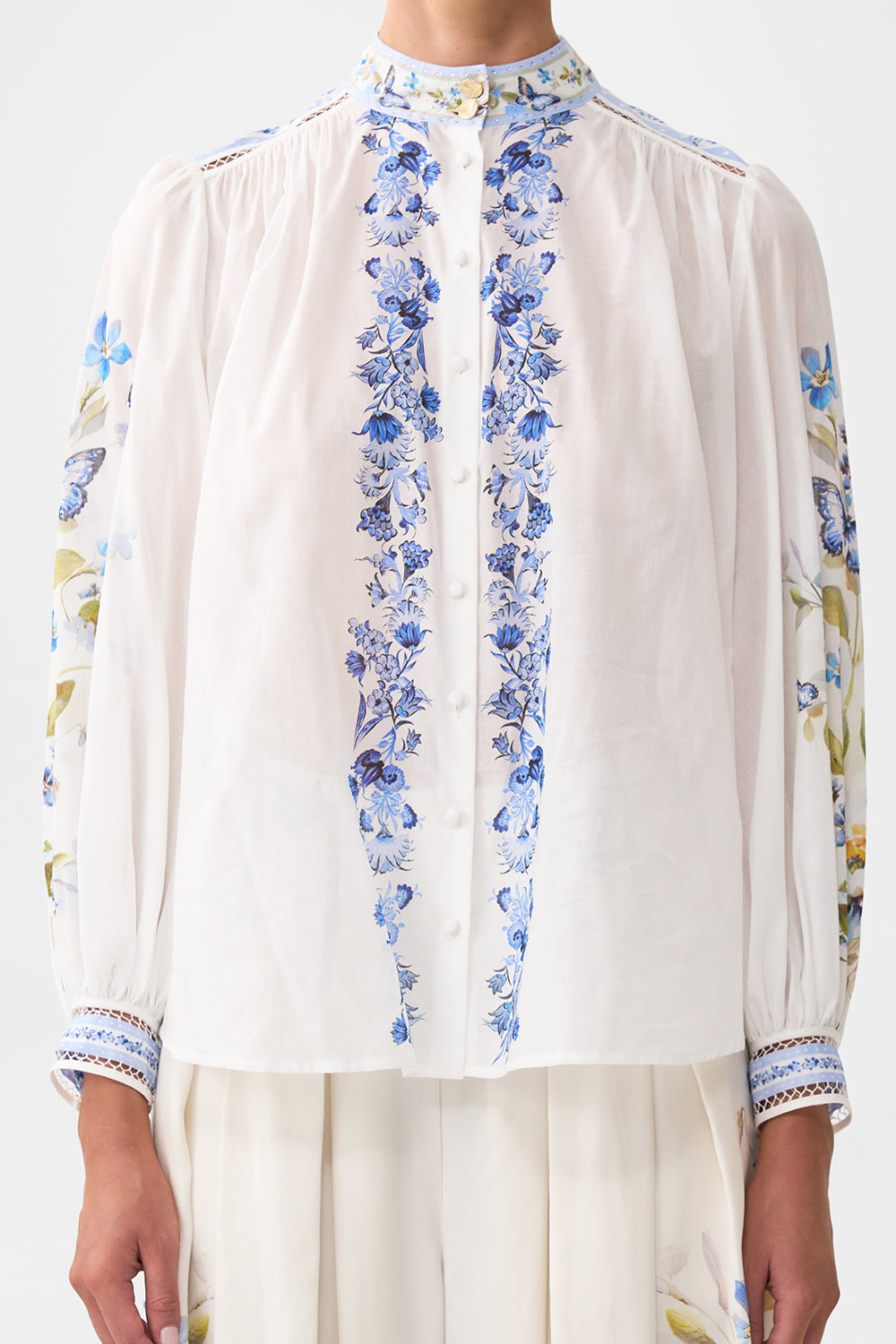 The CAMILLA HIGH NECK BUTTON THROUGH BLOUSE BOTANICAL BALLADS in our  print.
