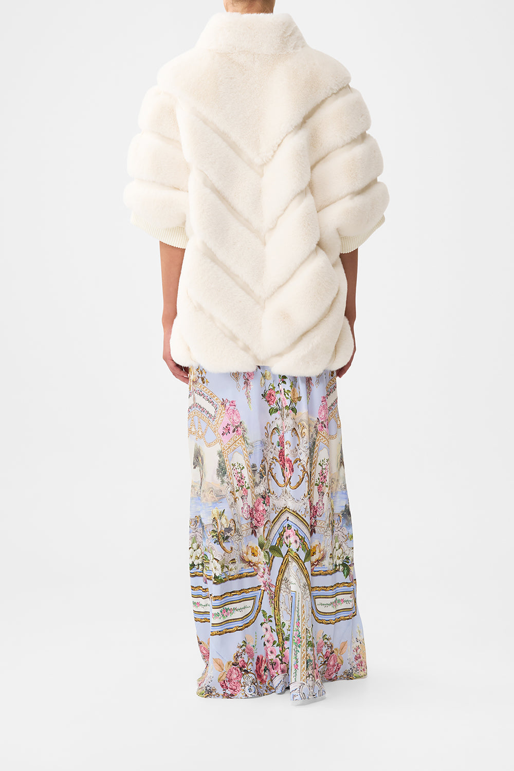 The CAMILLA FAUX FUR SHORT SLEEVE SLOUCH JACKET TILED IN TIME in our  print.