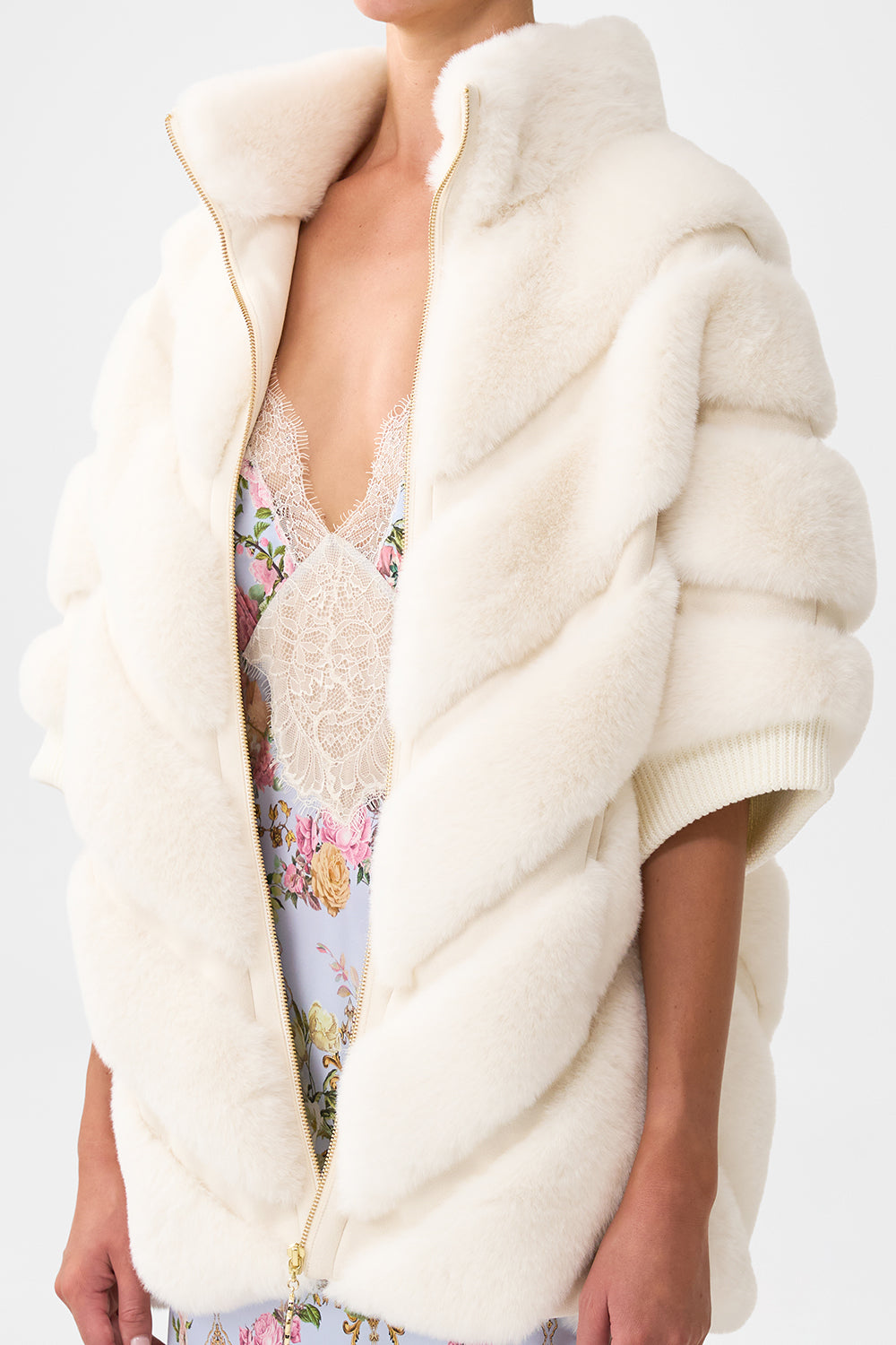 The CAMILLA FAUX FUR SHORT SLEEVE SLOUCH JACKET TILED IN TIME in our  print.