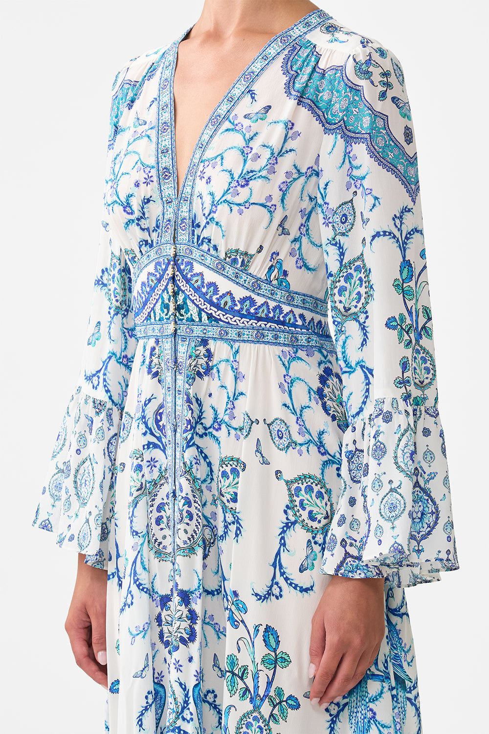 The CAMILLA SHAPED WAISTBAND DRESS WITH RUFFLE SLEEVE ISNIK LULLABY in our  print.