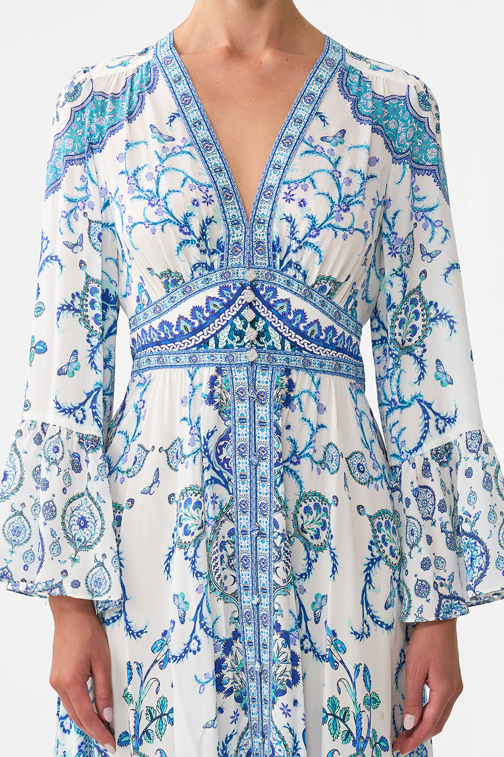 The CAMILLA shaped waistband dress with ruffle sleeve from our print Isnik lullaby