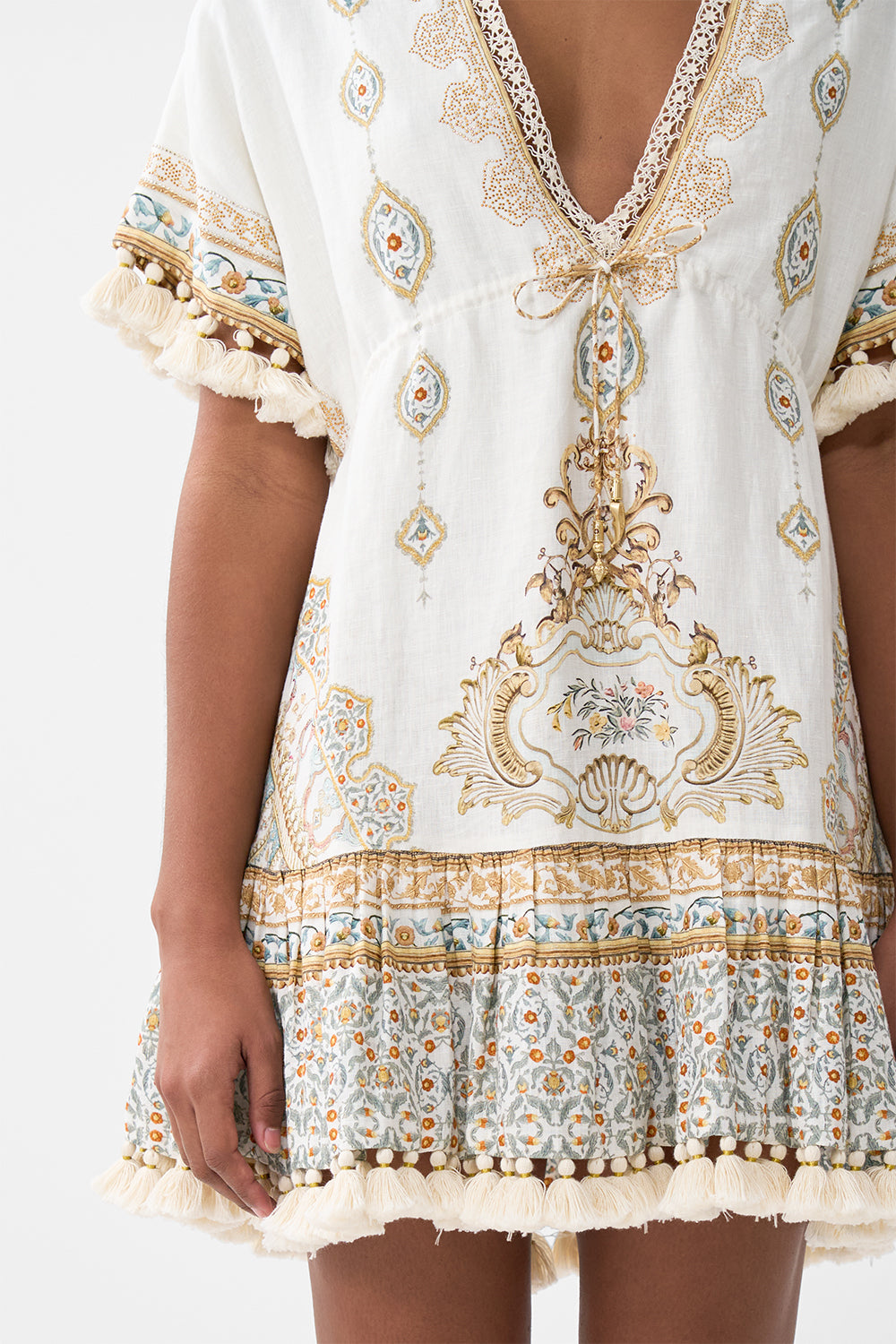 The CAMILLA SHORT V NECK EMBROIDERED DRESS OTTOMAN DYNASTY in our  print.