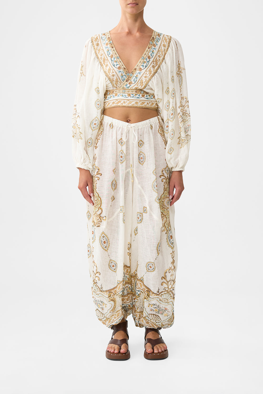 The CAMILLA CROPPED BLOUSON SLEEVE TIE FRONT TOP OTTOMAN DYNASTY in our OTTOMAN DYNASTY print.
