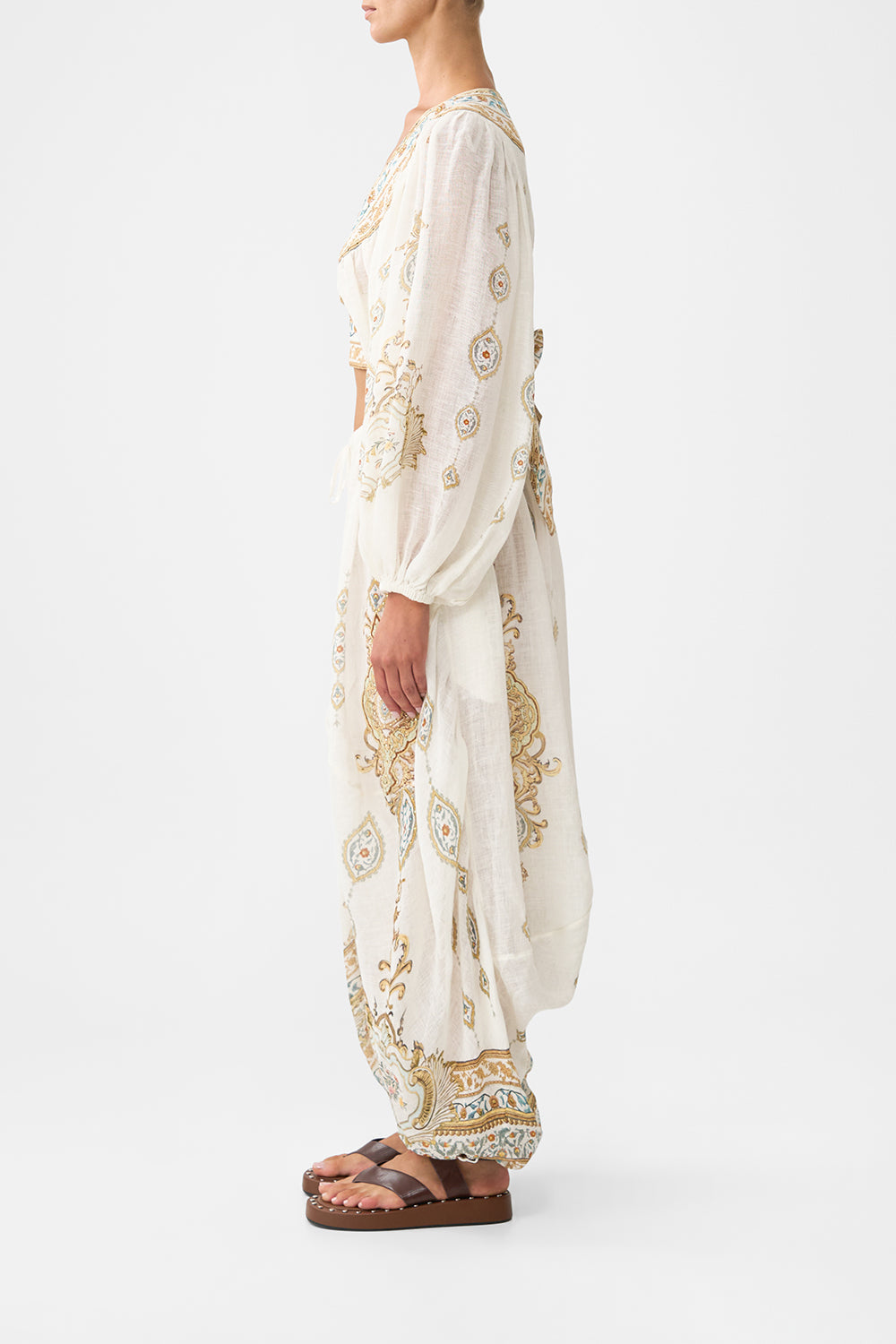 The CAMILLA CROPPED BLOUSON SLEEVE TIE FRONT TOP OTTOMAN DYNASTY in our  print.