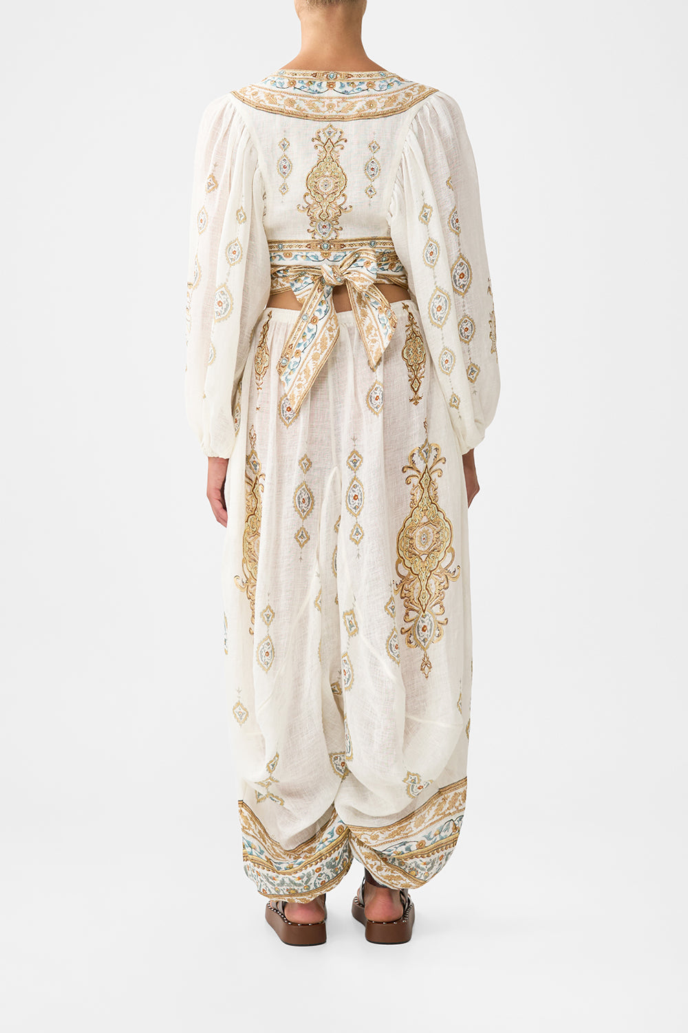 The CAMILLA CROPPED BLOUSON SLEEVE TIE FRONT TOP OTTOMAN DYNASTY in our  print.