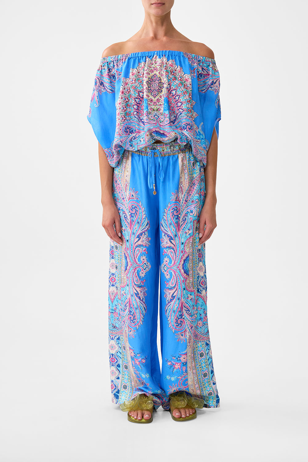 The CAMILLA OFF SHOULDER ELASTIC TOP FOOTSTEPS IN FOLKLORE in our FOOTSTEPS IN FOLKLORE print.