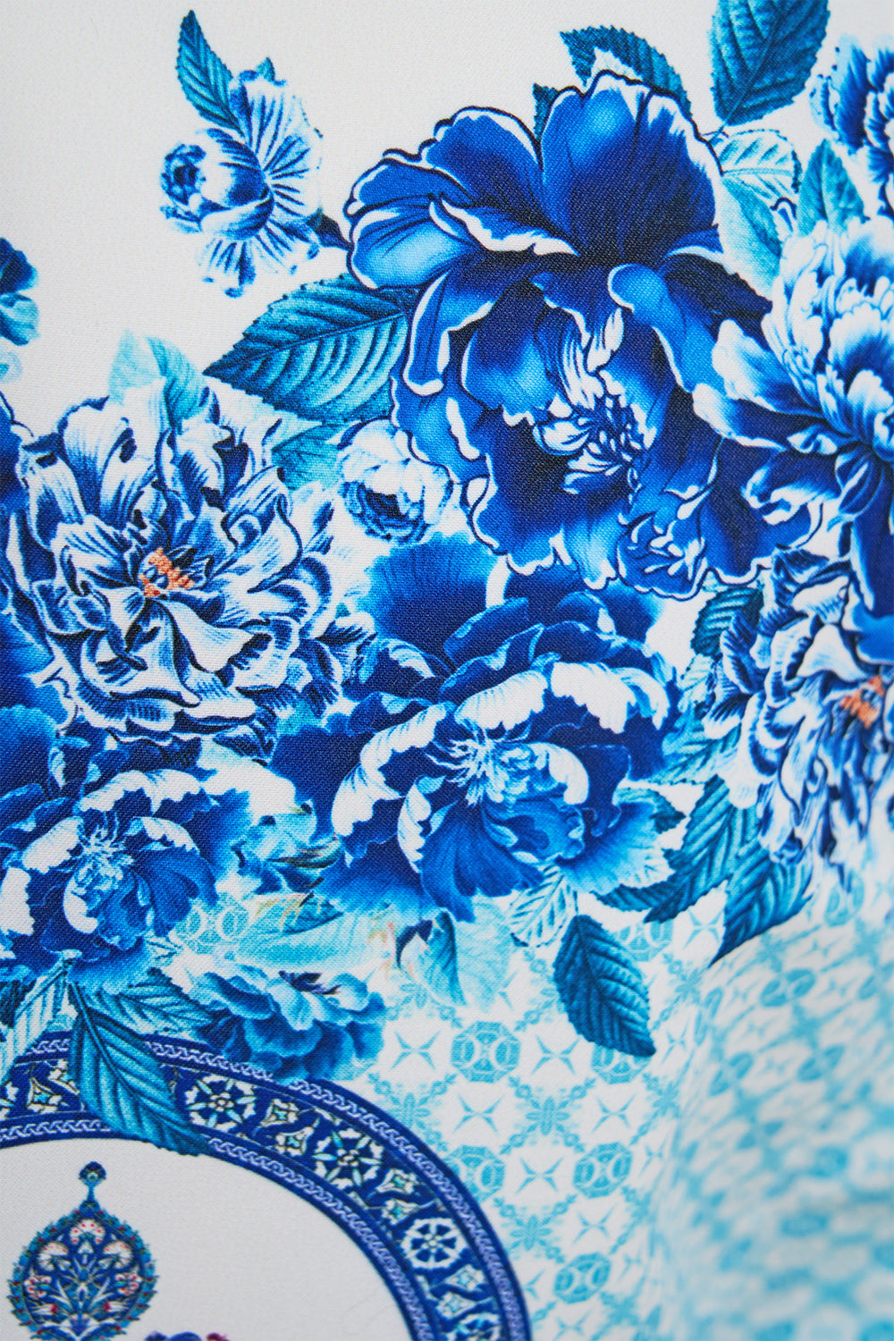 The CAMILLA MID LENGTH BOARDSHORT WITH FIXED WAIST A CERAMIC GARDEN in our  print.