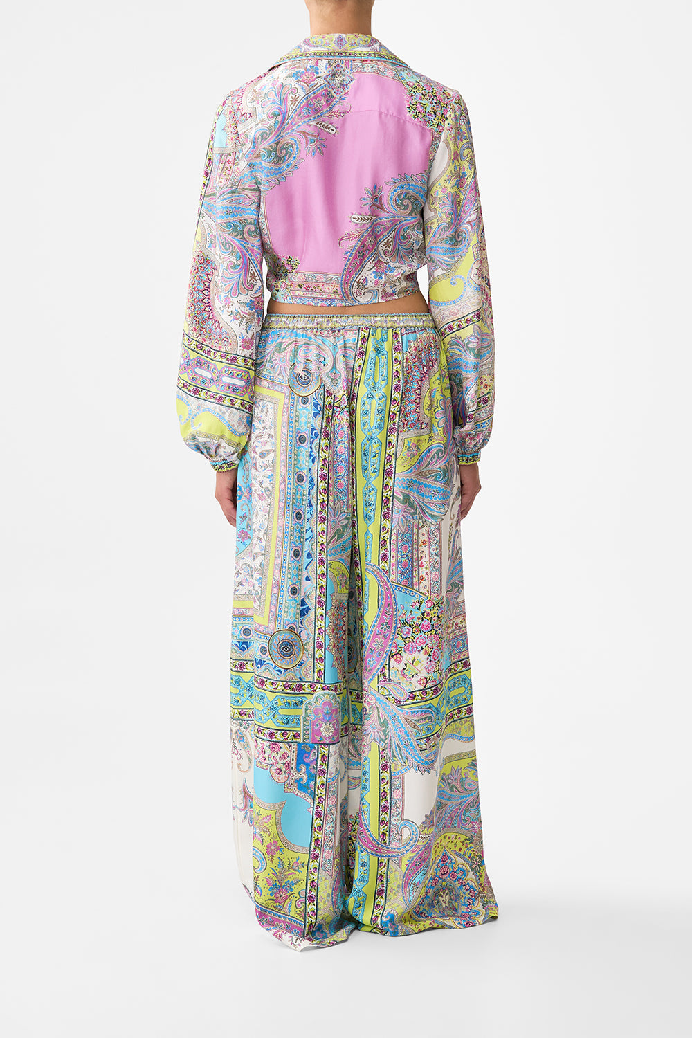 The CAMILLA CROPPED WRAP SHIRT MAGIC CARPET RIDE in our  print.