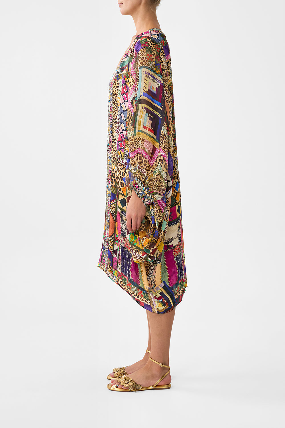 The CAMILLA DRAMATIC SLEEVE COCOON LAYER EMBROIDERED EVER AFTER in our  print.