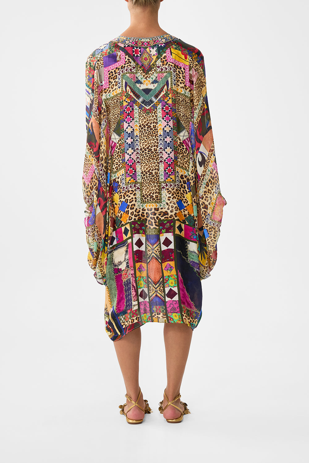 The CAMILLA DRAMATIC SLEEVE COCOON LAYER EMBROIDERED EVER AFTER in our  print.
