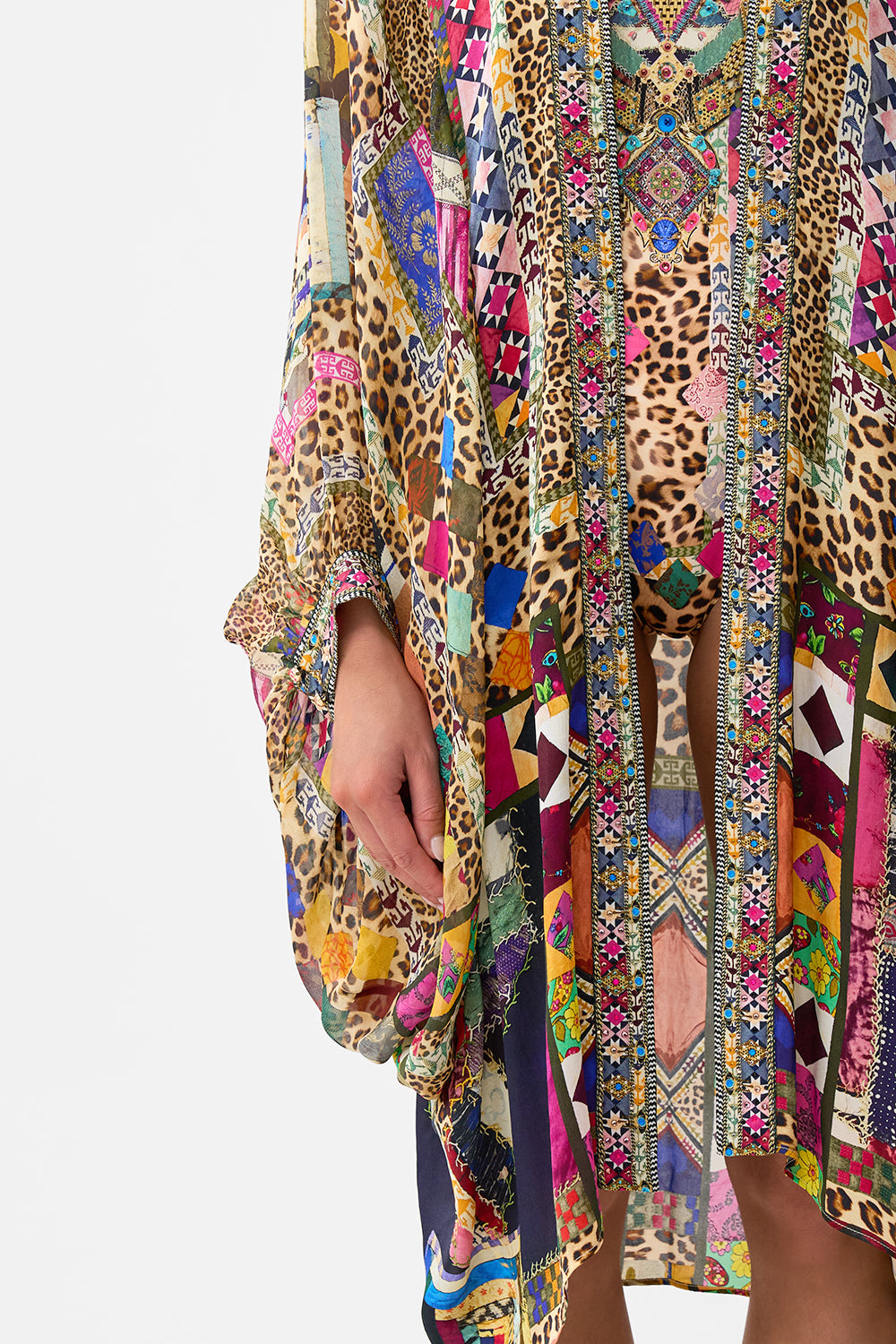 The CAMILLA DRAMATIC SLEEVE COCOON LAYER EMBROIDERED EVER AFTER in our  print.