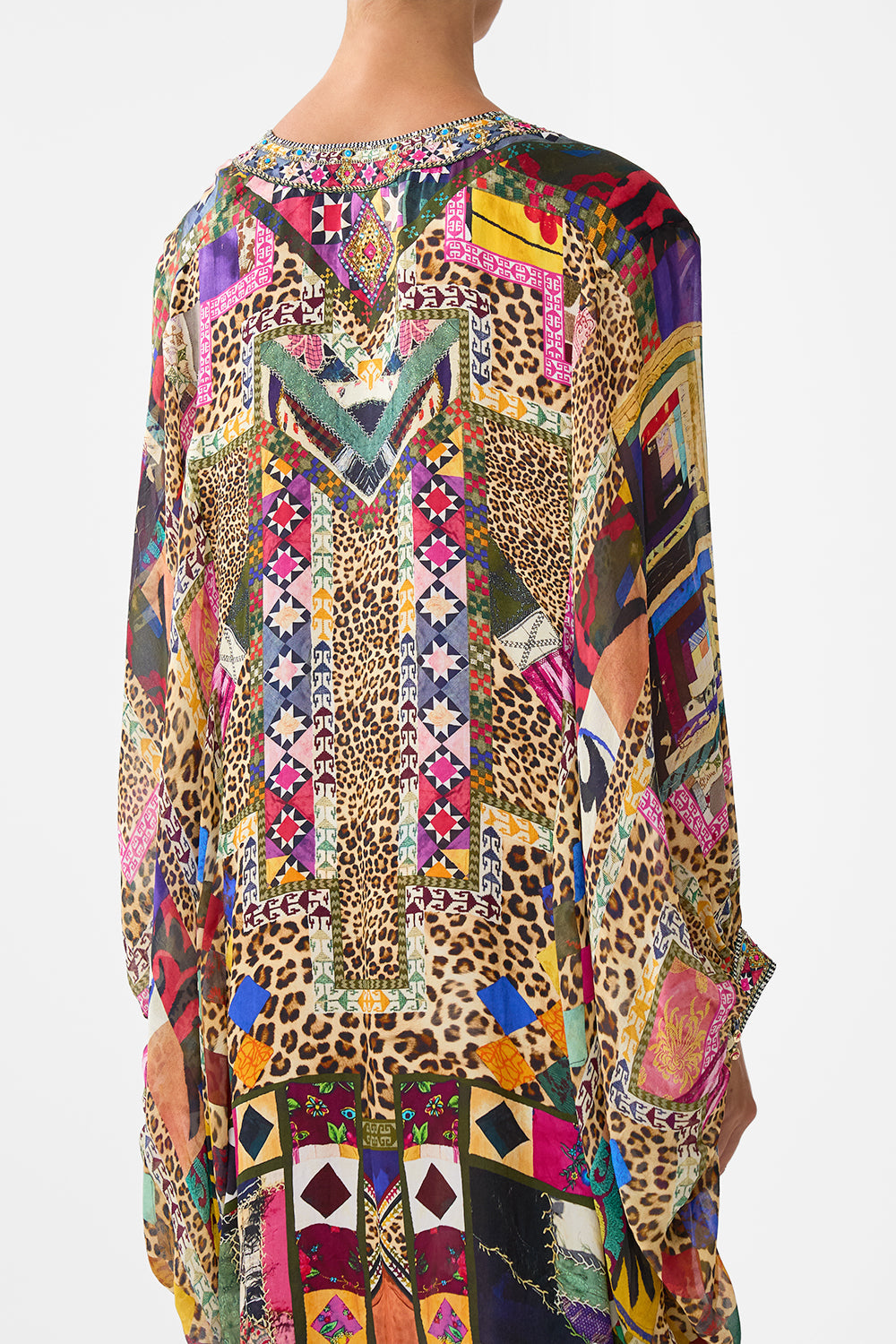 The CAMILLA DRAMATIC SLEEVE COCOON LAYER EMBROIDERED EVER AFTER in our  print.