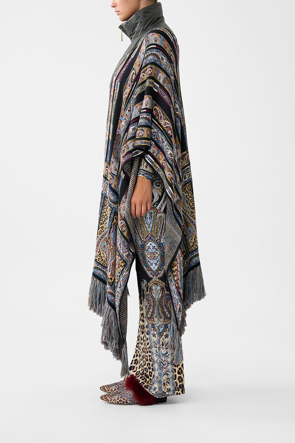 The CAMILLA QUILTED COLLAR KNIT PONCHO ISTANBUL ANIMALIA in our  print.