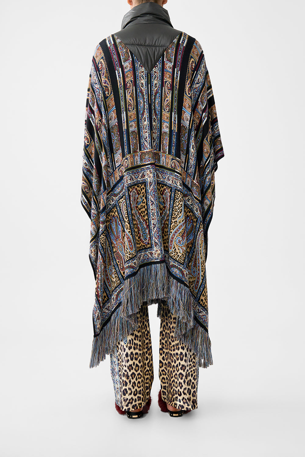 The CAMILLA QUILTED COLLAR KNIT PONCHO ISTANBUL ANIMALIA in our  print.