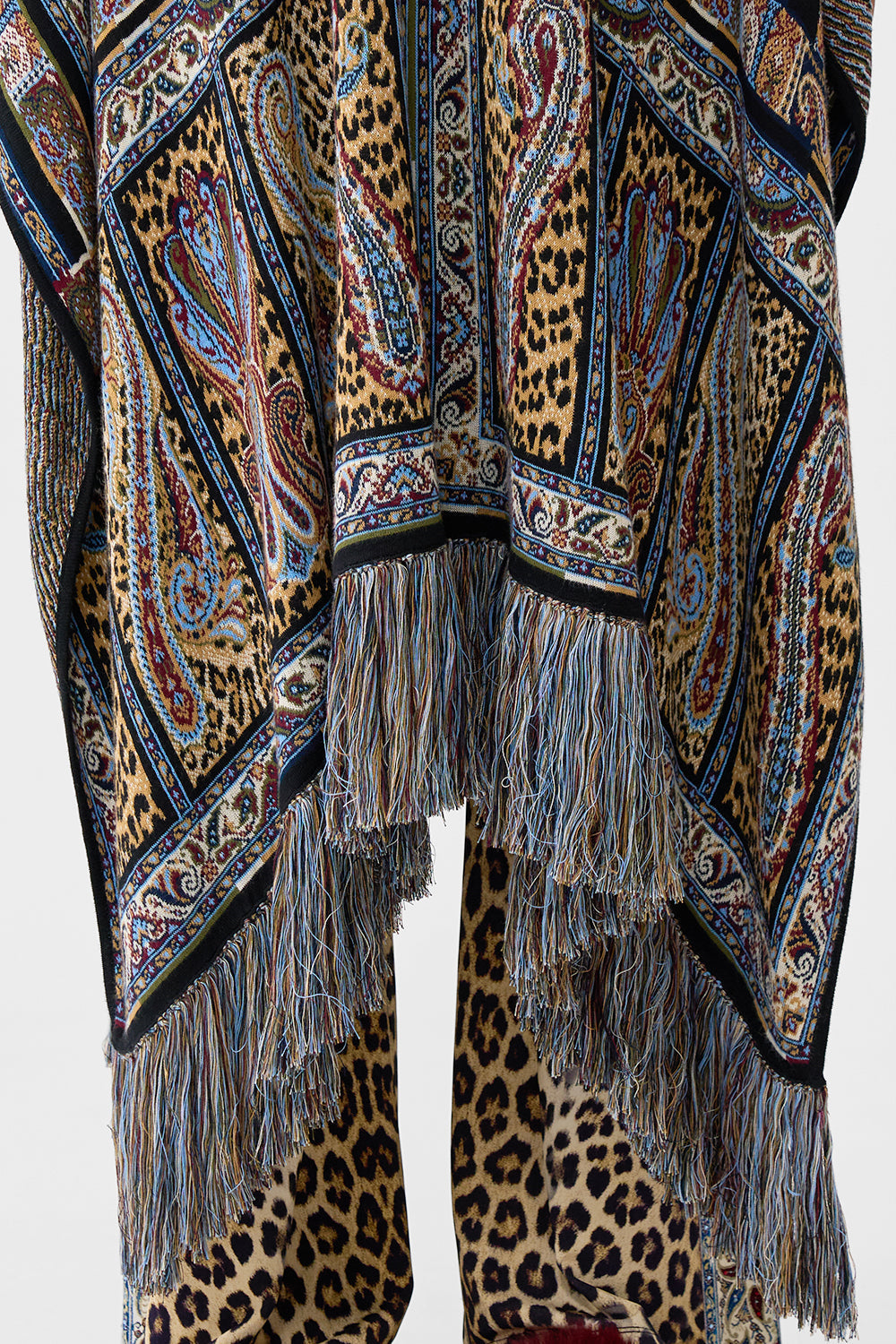 The CAMILLA QUILTED COLLAR KNIT PONCHO ISTANBUL ANIMALIA in our  print.