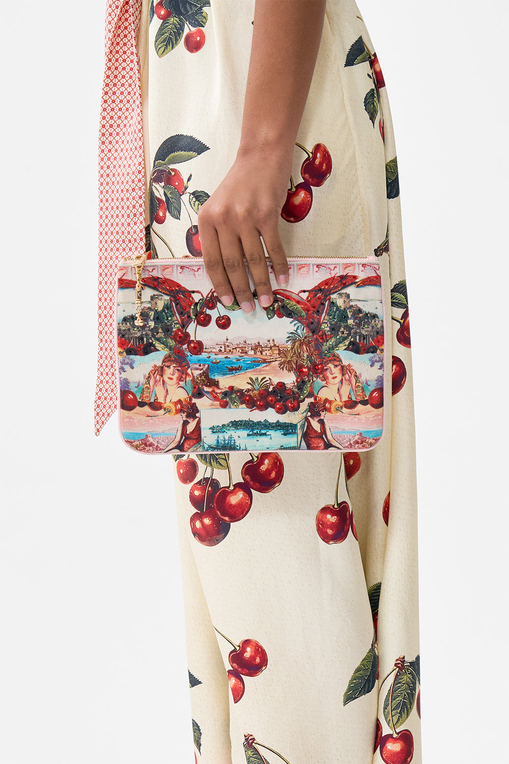 The CAMILLA small canvas clutch from our print notes from the road