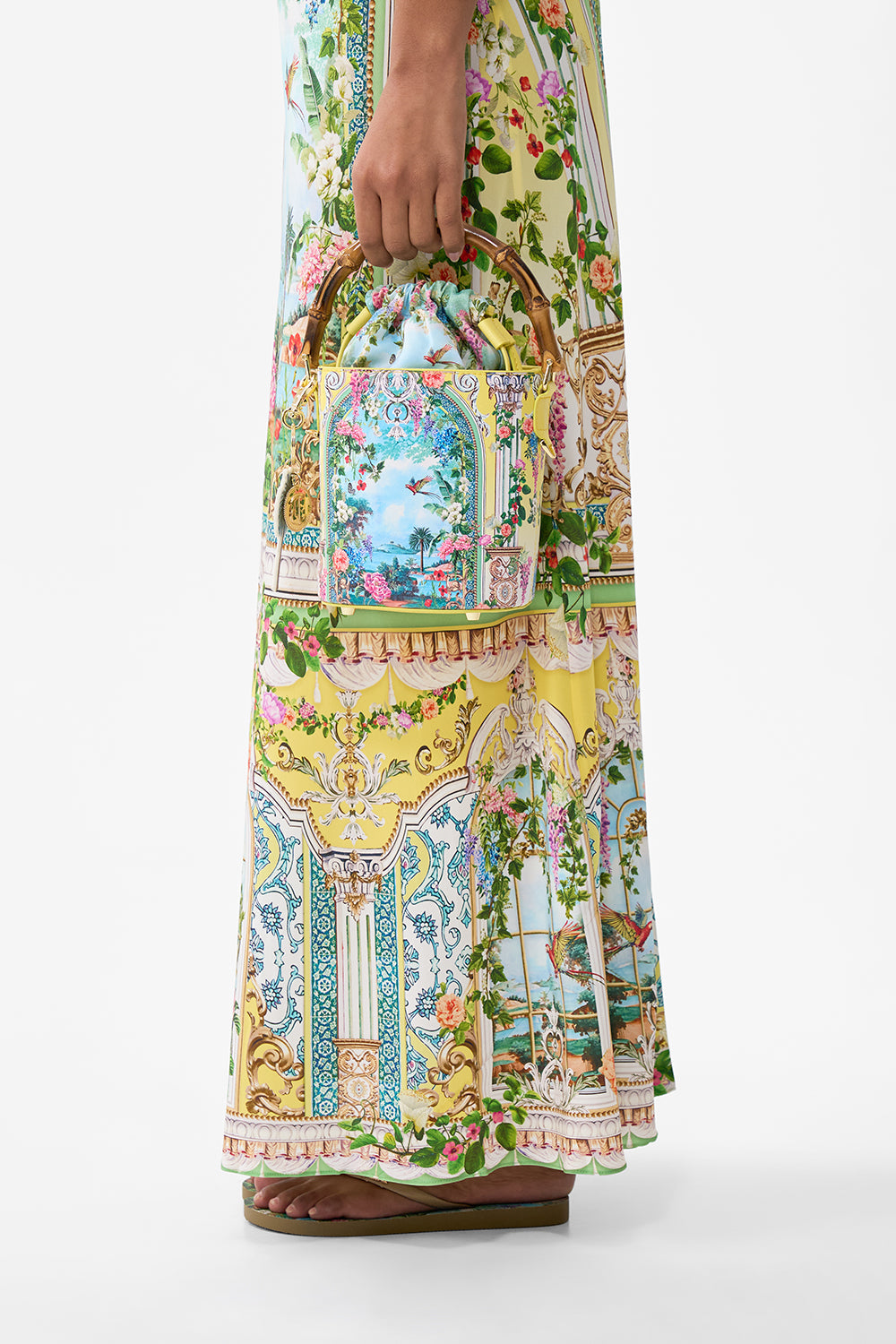 The CAMILLA DRAWSTRING BUCKET BAG WITH KEYRING TALES OF TOPKAPI PALACE in our  print.