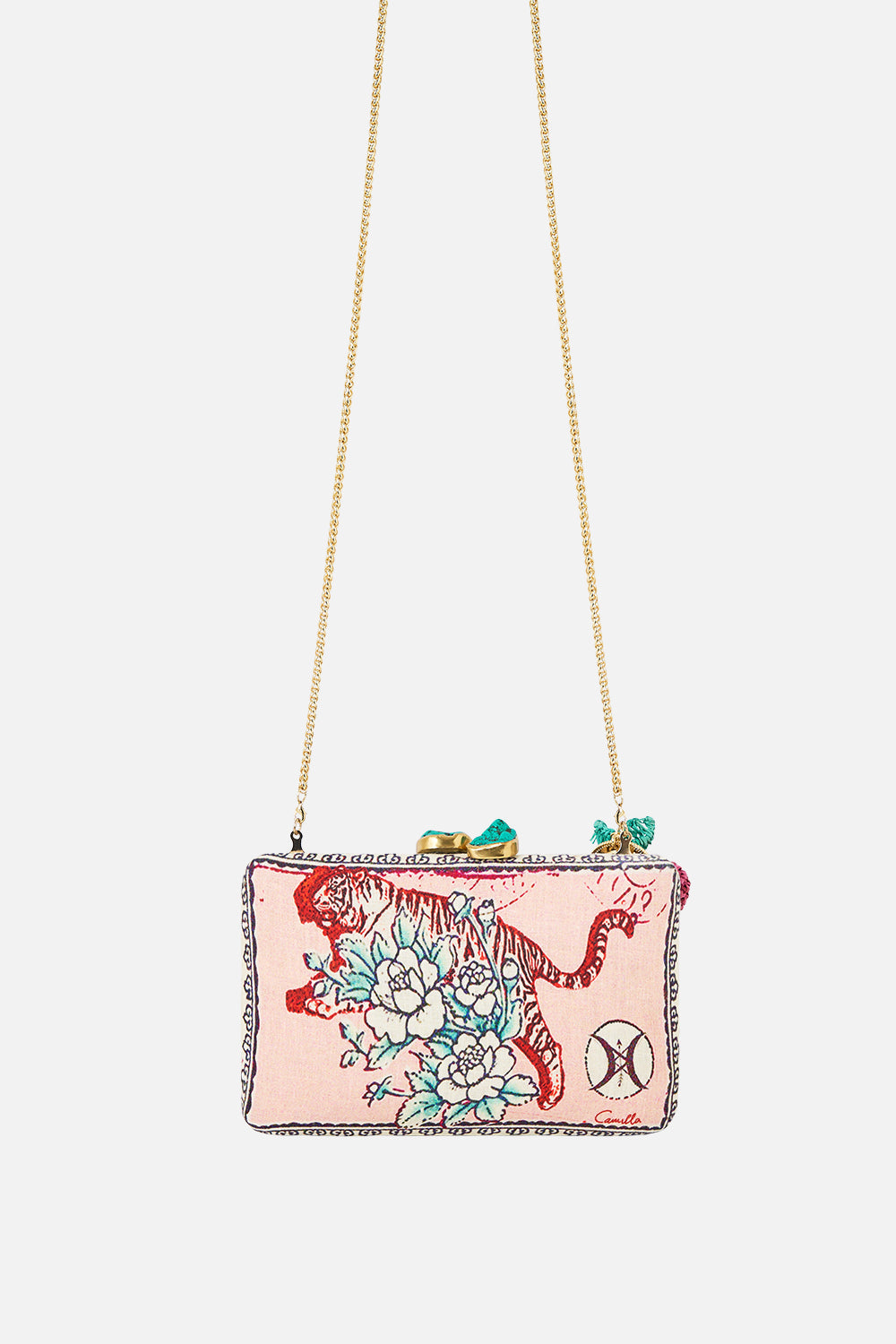 The CAMILLA hardcase clutch with raffia detail from our print notes from the road