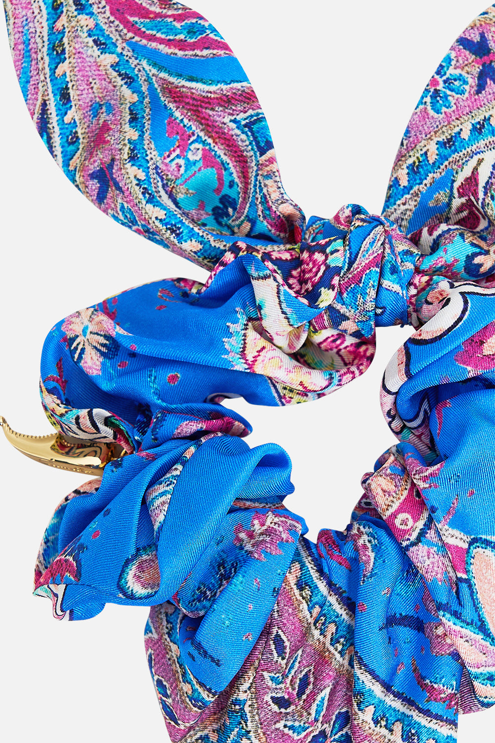 The CAMILLA SCRUNCHIE WITH TIE AND CHARM FOOTSTEPS IN FOLKLORE in our  print.