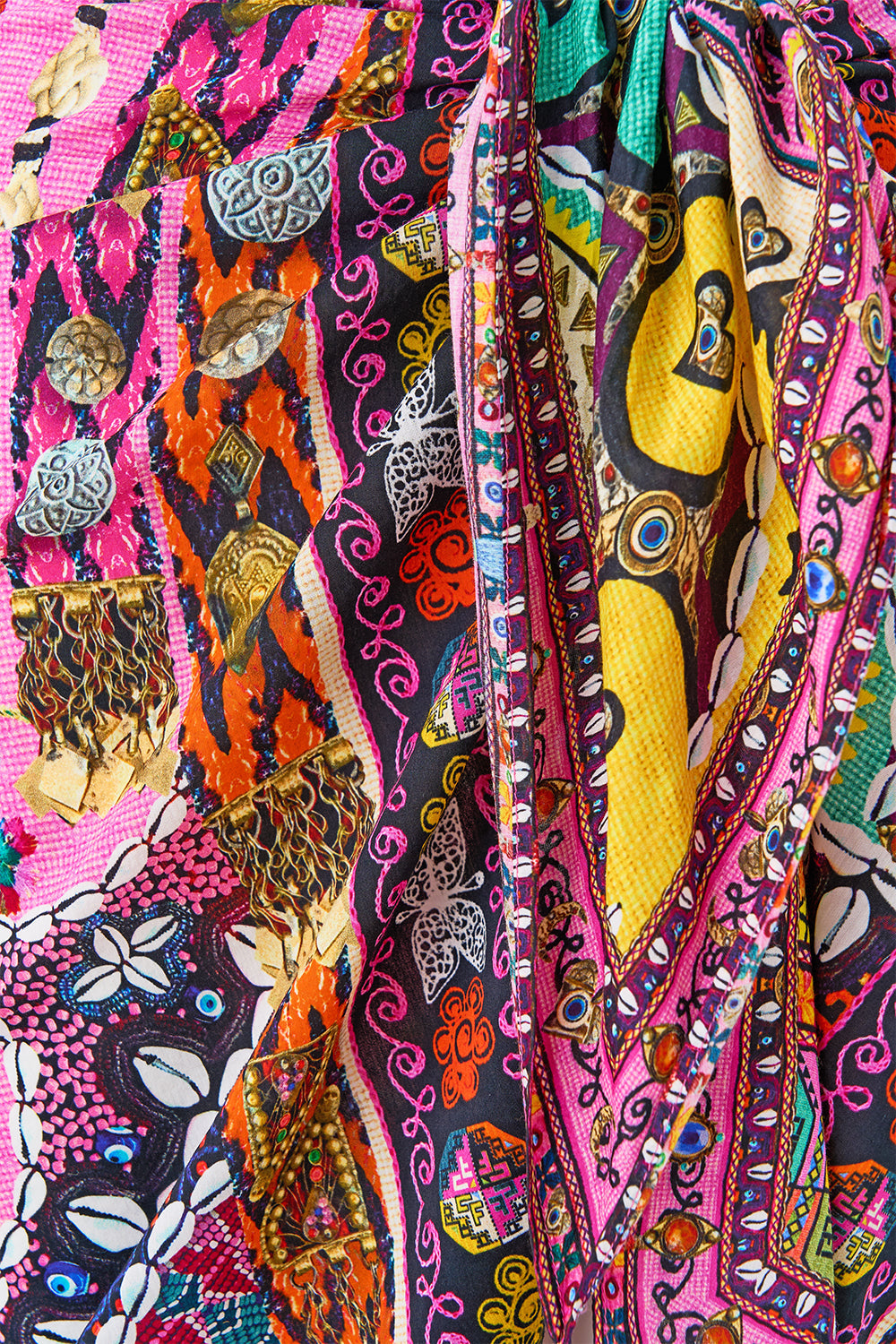 The CAMILLA WOVEN SHORT SARONG WITH TASSELS PATCHWORK PANORAMA in our  print.