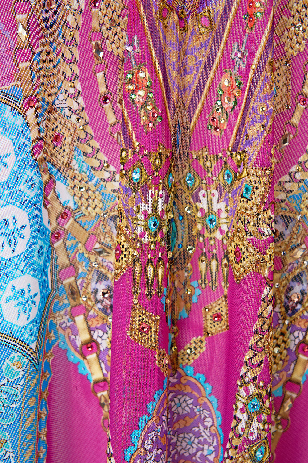 The CAMILLA long v neck kaftan with ring front trim from our print concubines, sultans & courtiers