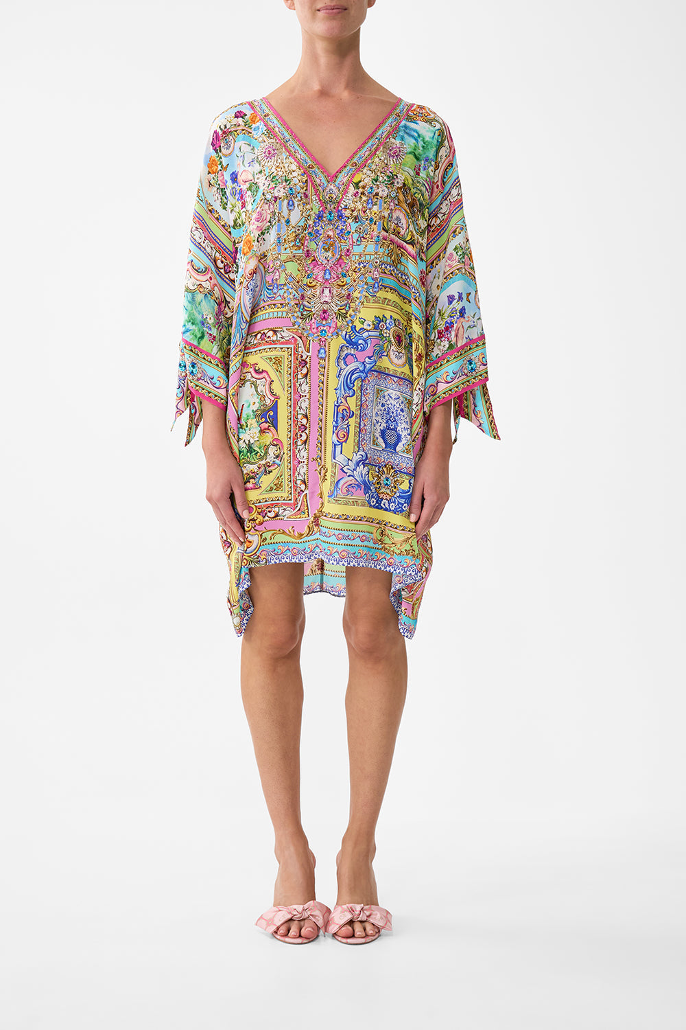 The CAMILLA TIE SLEEVE SHORT V NECK KAFTAN SPIRIT OF SANTA MARIA in our SPIRIT OF SANTA MARIA print.