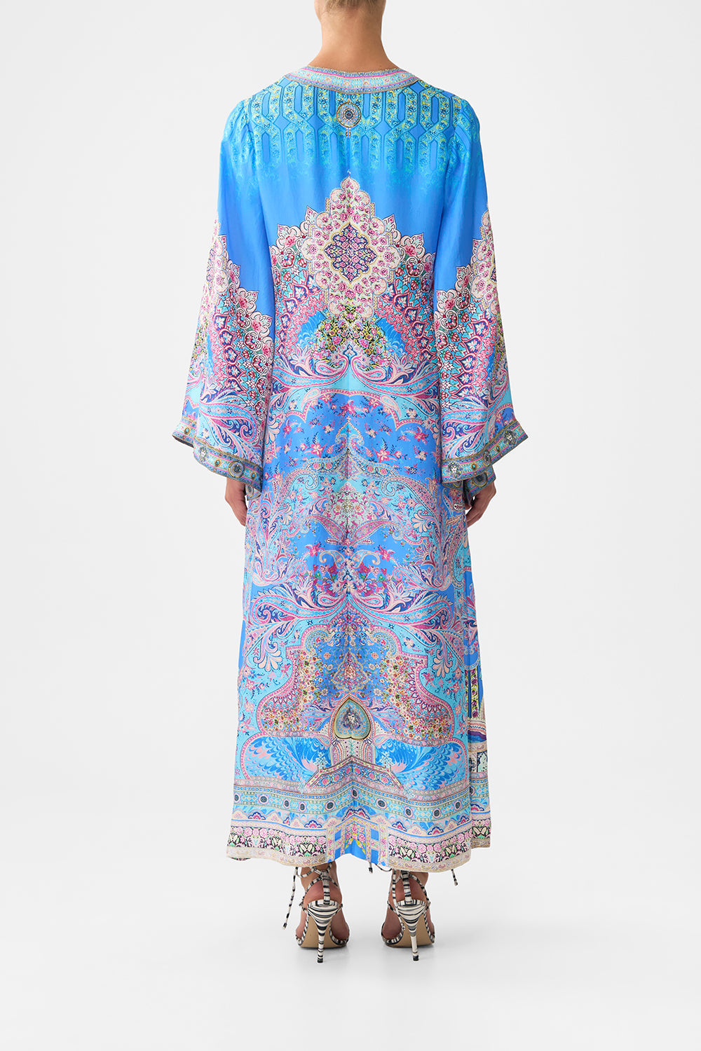 The CAMILLA DEEP V NECK HARDWARE KAFTAN FOOTSTEPS IN FOLKLORE in our  print.