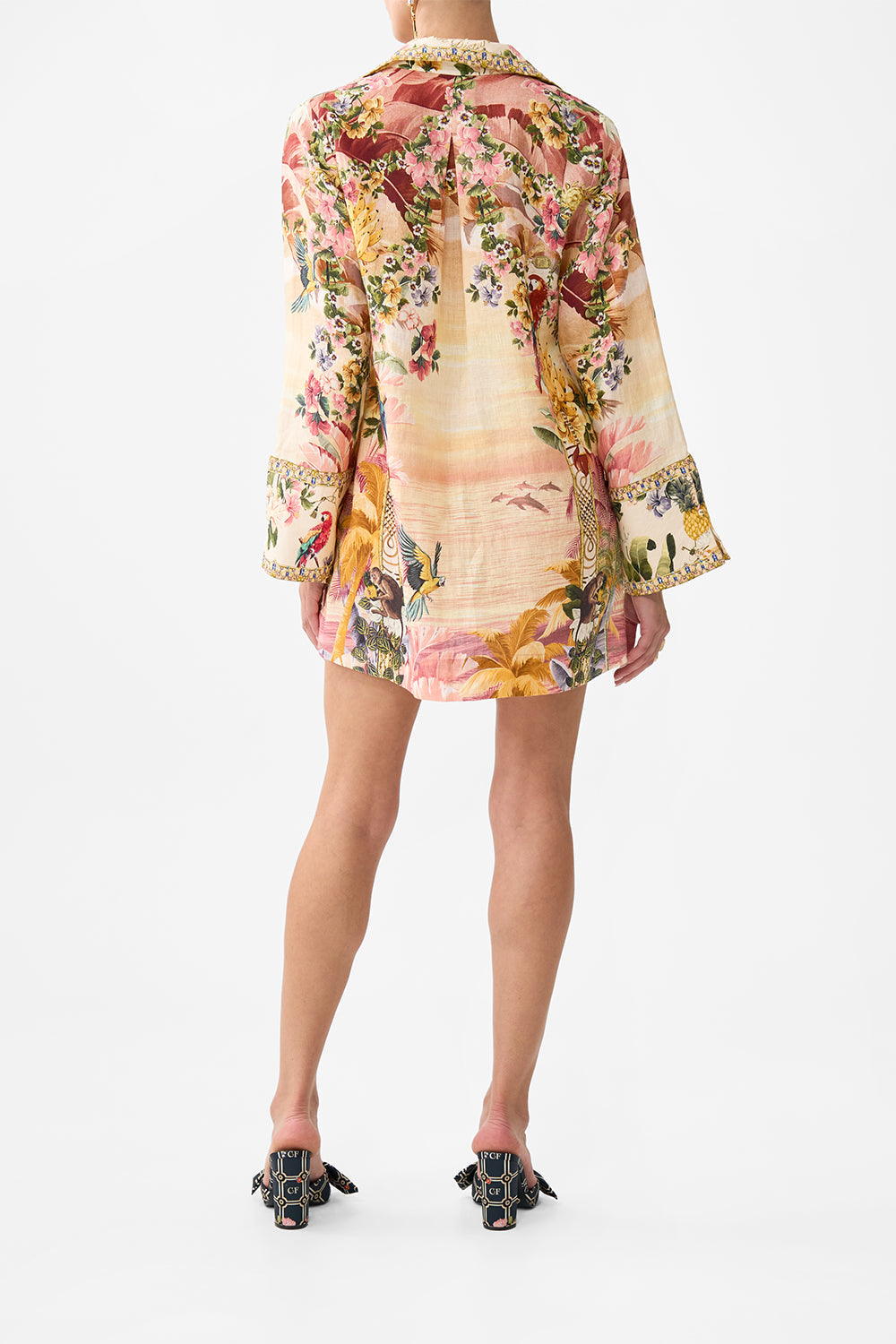 The CAMILLA LONG SLEEVE TUNIC DRESS WELCOME TO THE WHITE LOTUS in our  print.