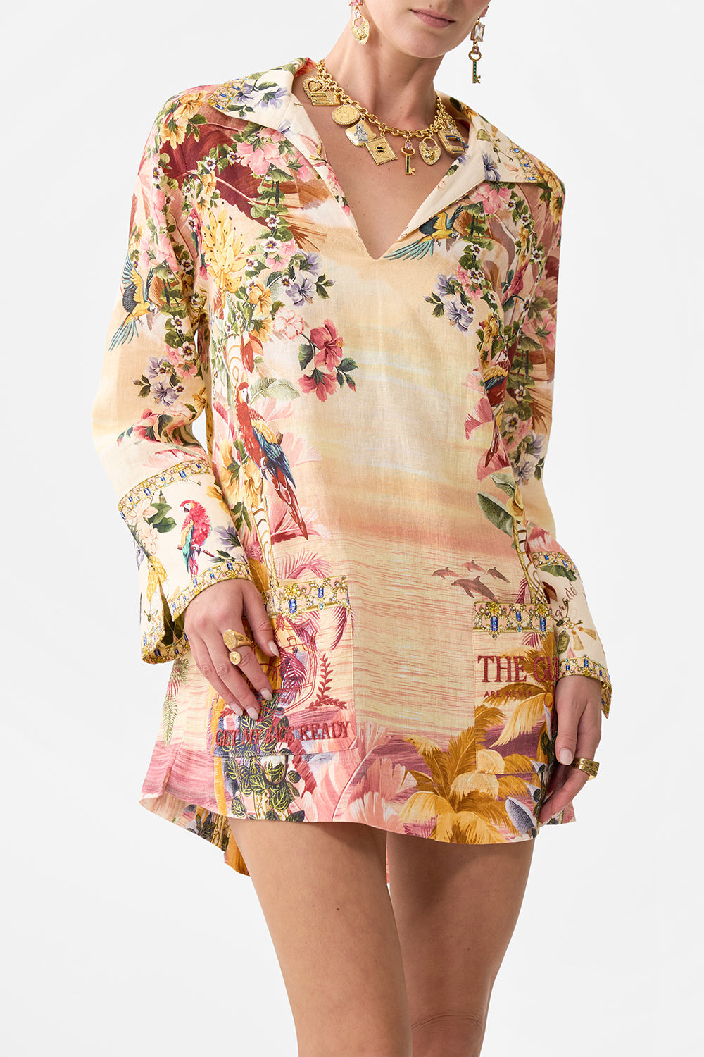 The CAMILLA LONG SLEEVE TUNIC DRESS WELCOME TO THE WHITE LOTUS in our  print.