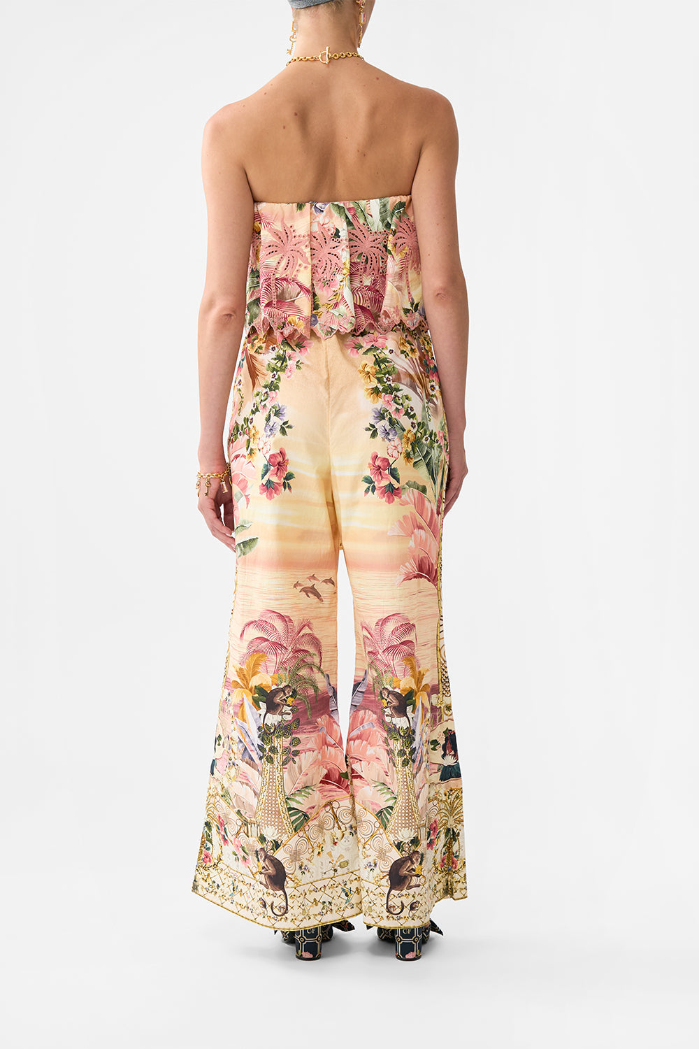 The CAMILLA STRAPLESS JUMPSUIT WITH FRILL WELCOME TO THE WHITE LOTUS in our  print.