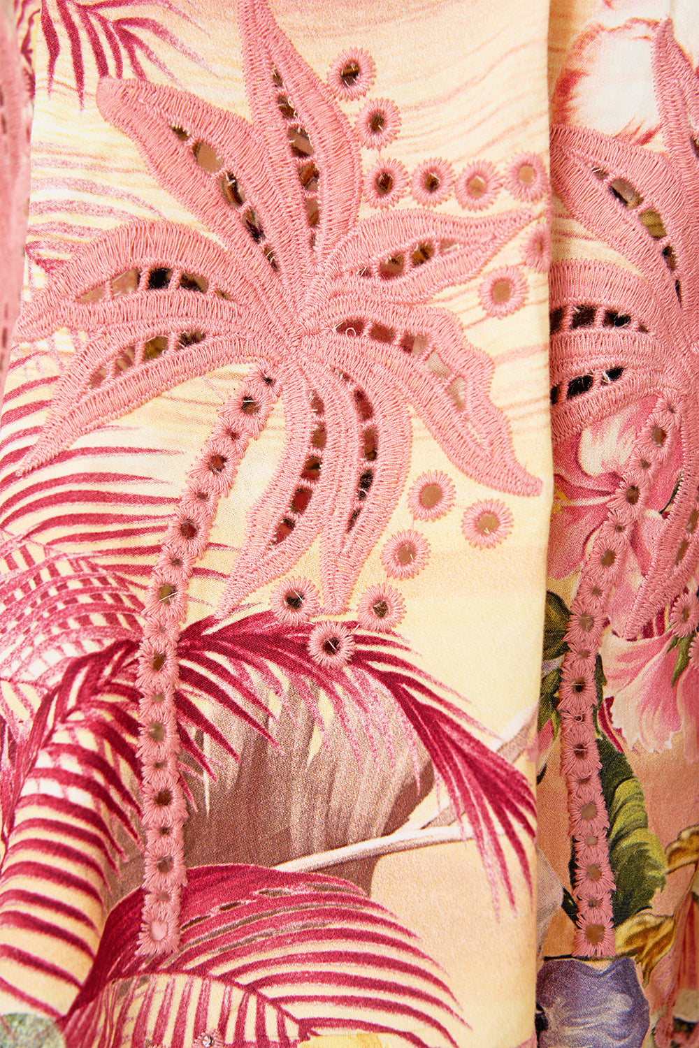 The CAMILLA STRAPLESS JUMPSUIT WITH FRILL WELCOME TO THE WHITE LOTUS in our  print.