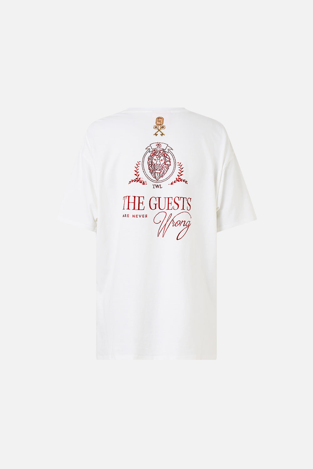 The CAMILLA OVERSIZED BAND TEE WELCOME TO THE WHITE LOTUS in our  print.