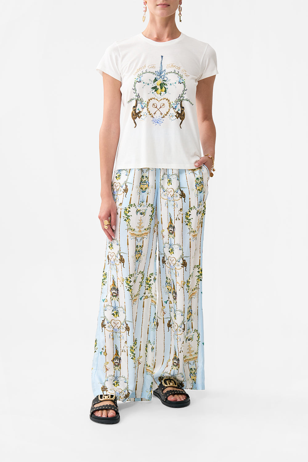 The CAMILLA SLIM FIT ROUND NECK T-SHIRT VENUS ON A VESPA in our VENUS ON A VESPA print.