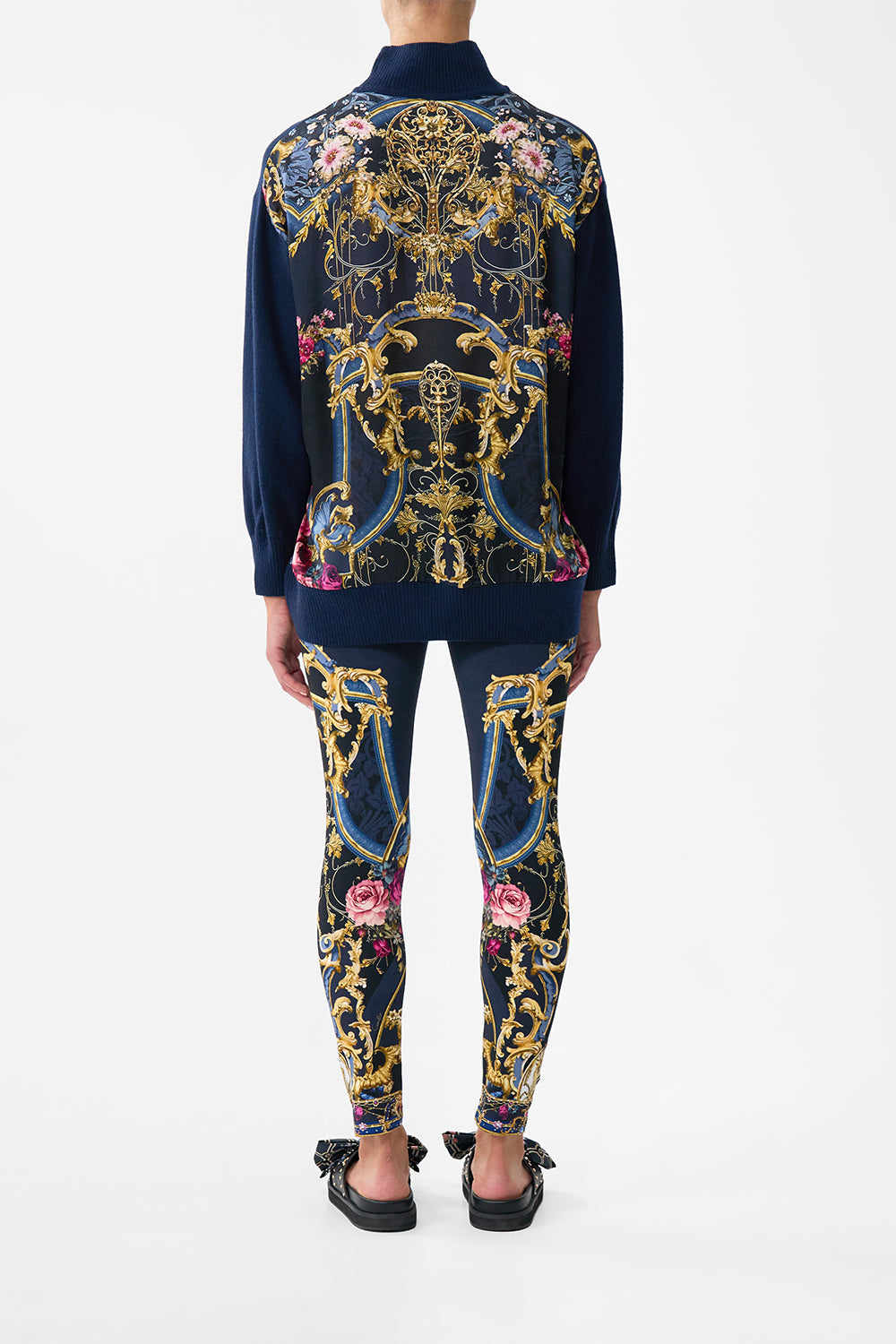 The CAMILLA SILK BACK TURTLE NECK KNIT ORNATE ON A PLATE in our  print.