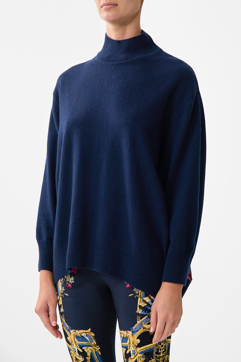 The CAMILLA SILK BACK TURTLE NECK KNIT ORNATE ON A PLATE in our  print.