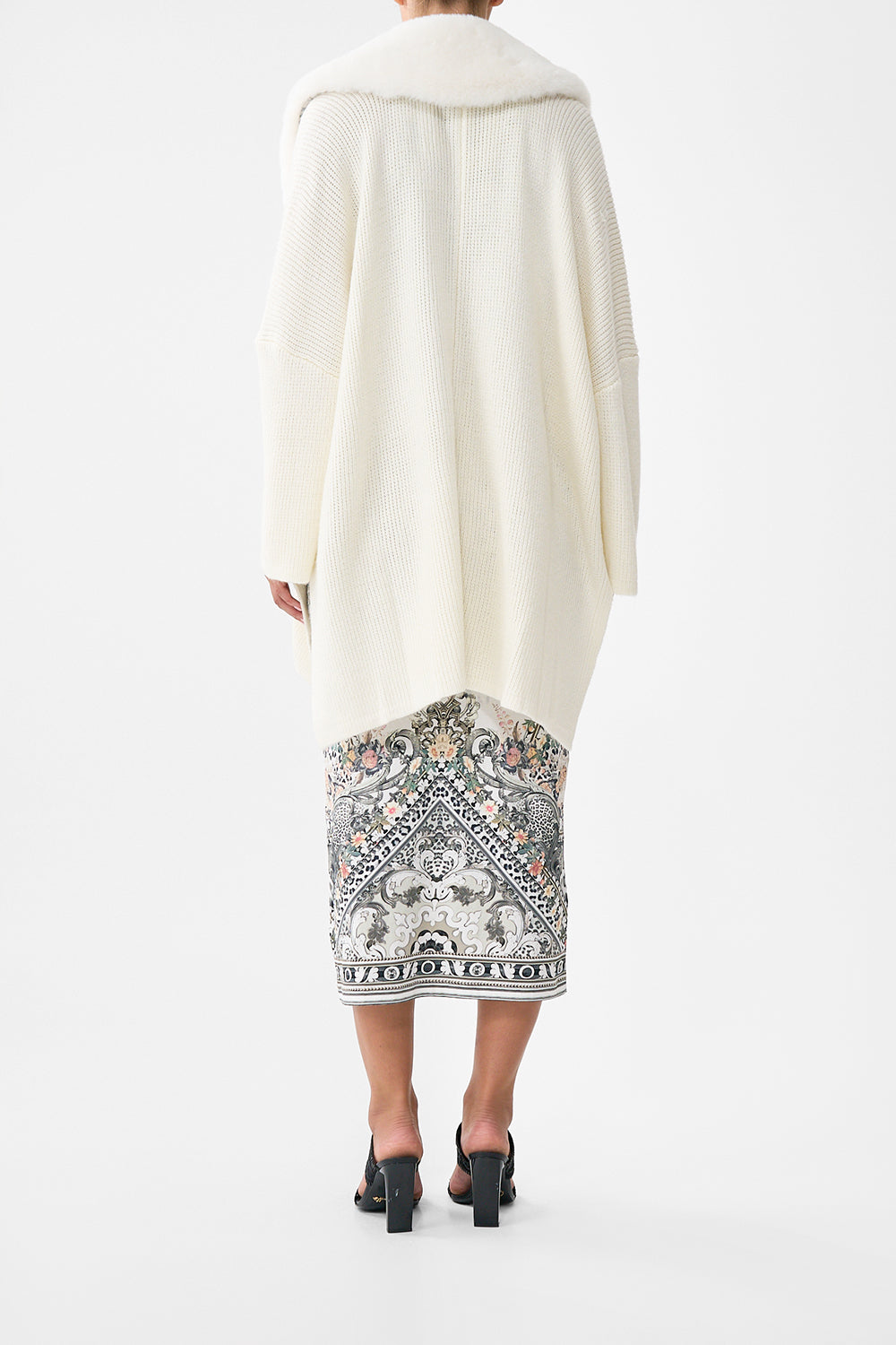 The CAMILLA KNIT RELAXED LAYER WITH FAUX FUR MARBLE HEAVEN in our  print.