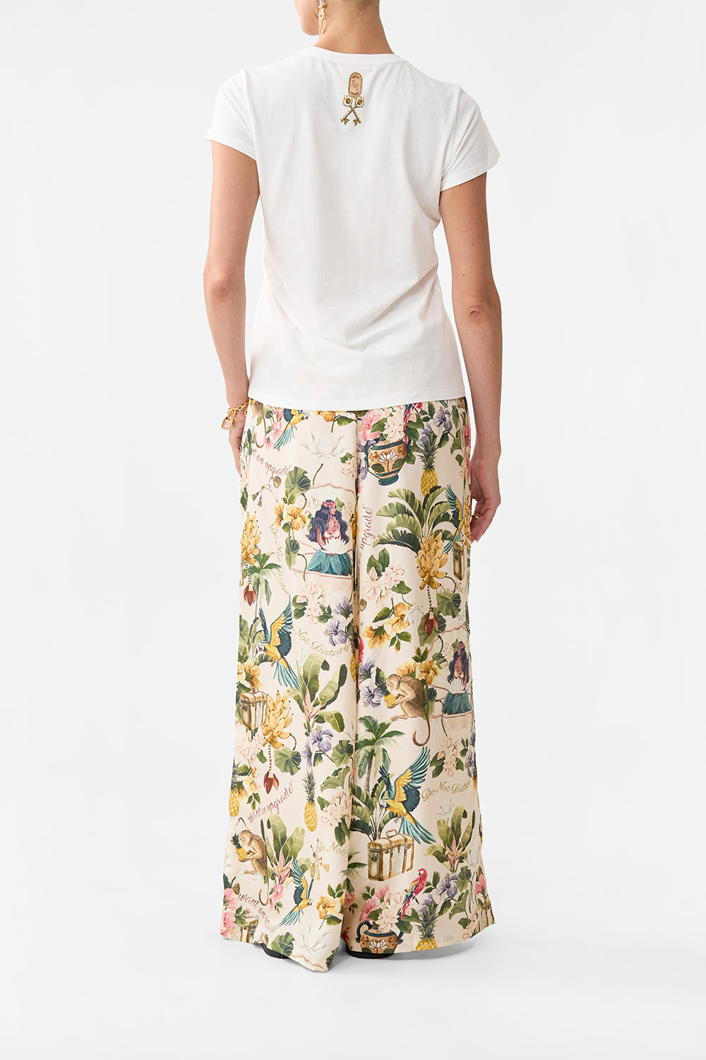 The CAMILLA SLIM FIT ROUND NECK T-SHIRT WELCOME TO THE WHITE LOTUS in our  print.