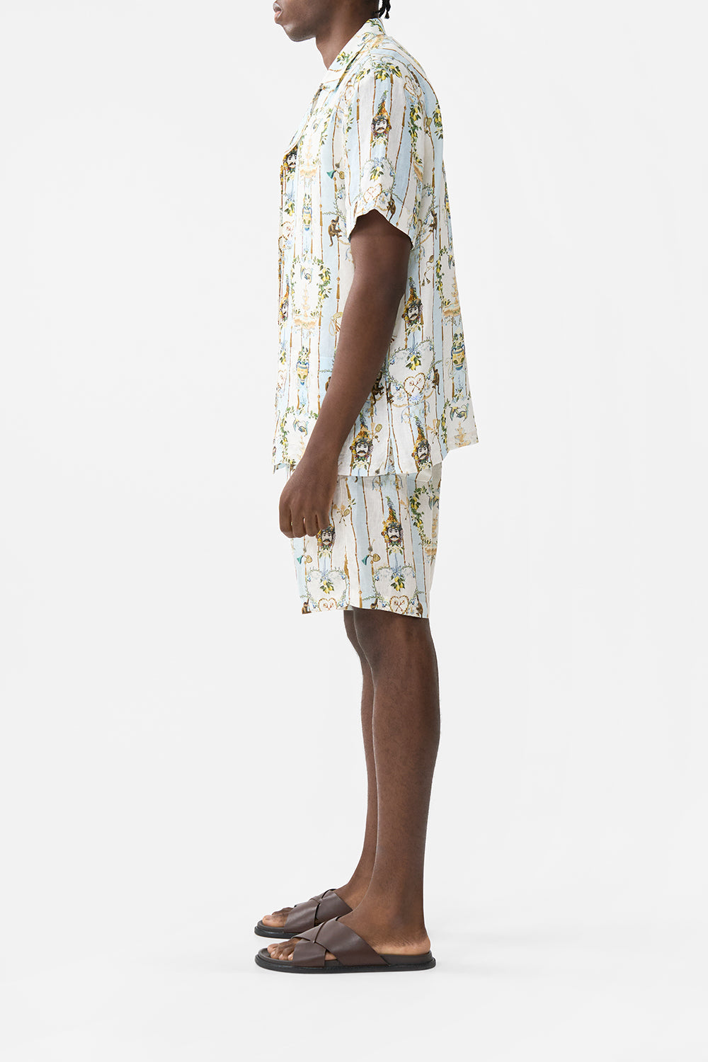 The CAMILLA MID LENGTH WALK SHORT VENUS ON A VESPA in our  print.