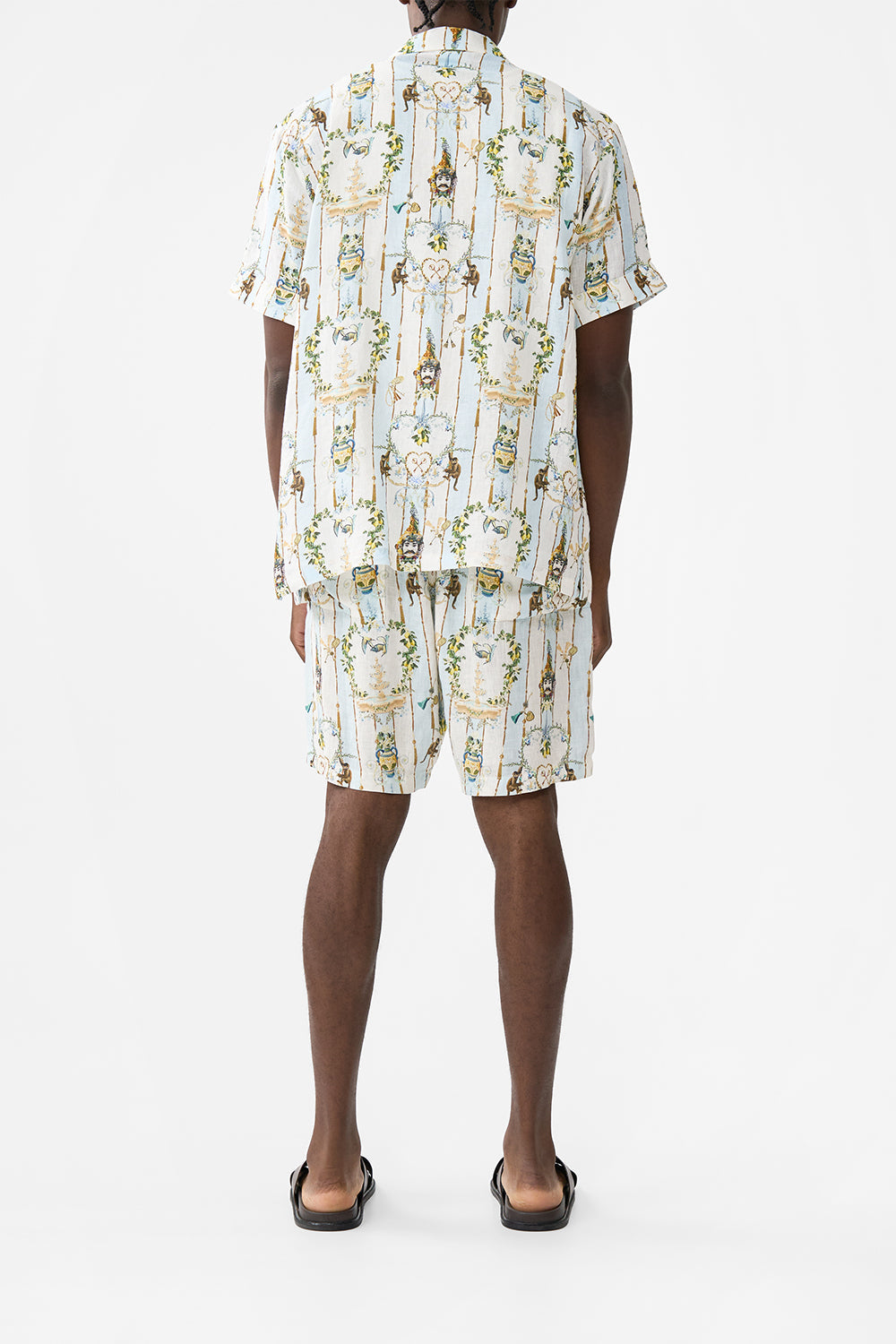 The CAMILLA MID LENGTH WALK SHORT VENUS ON A VESPA in our  print.