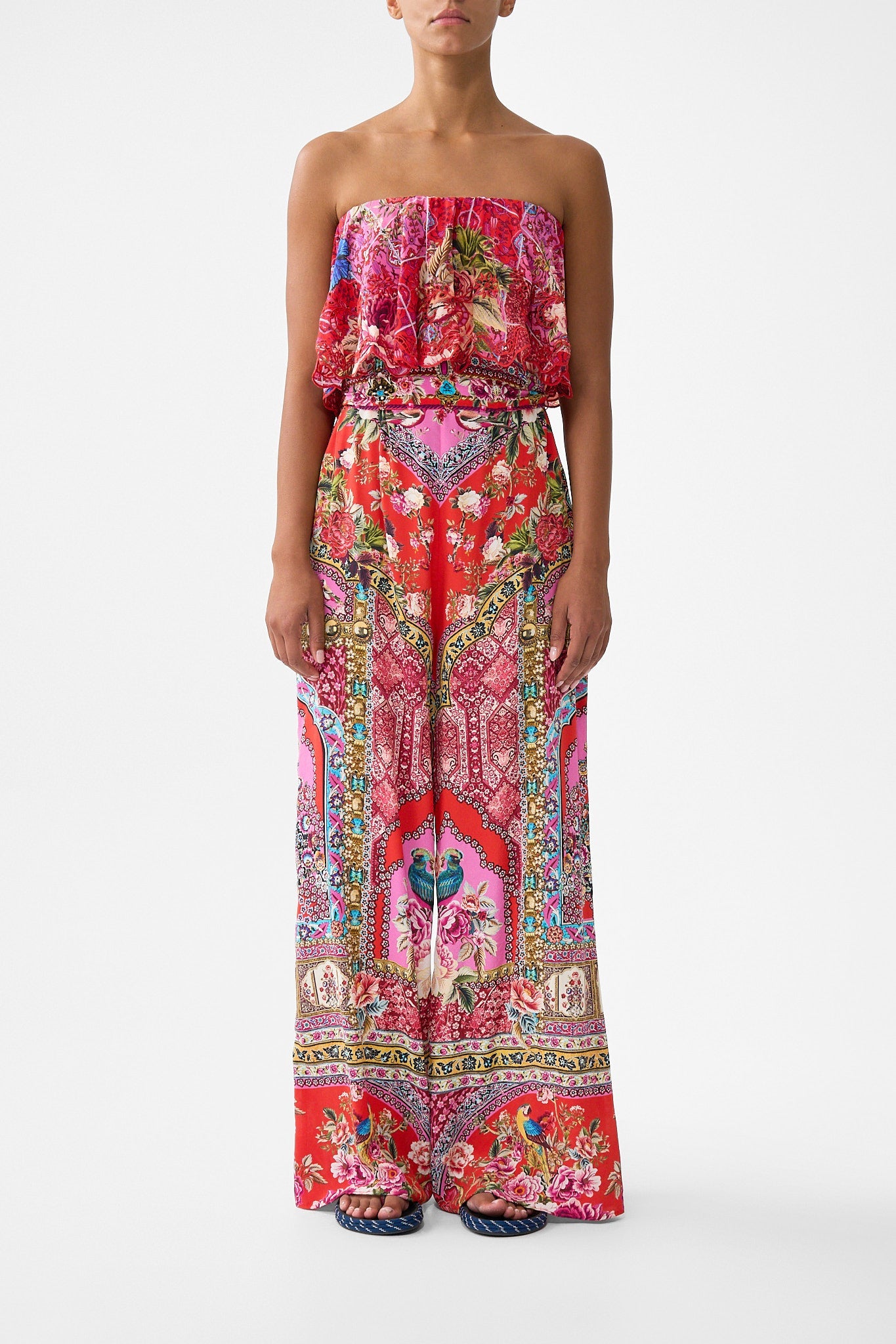 The CAMILLA STRAPLESS JUMPSUIT WITH FRILL HEIRLOOM EMPIRE in our HEIRLOOM EMPIRE print.
